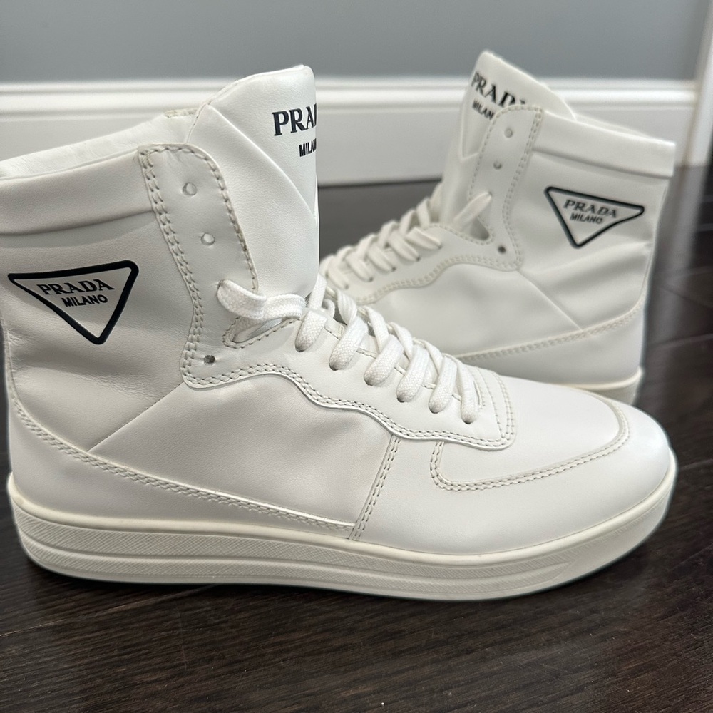 Prada leather logo high top sneakers size 38 1/2
Wore one time